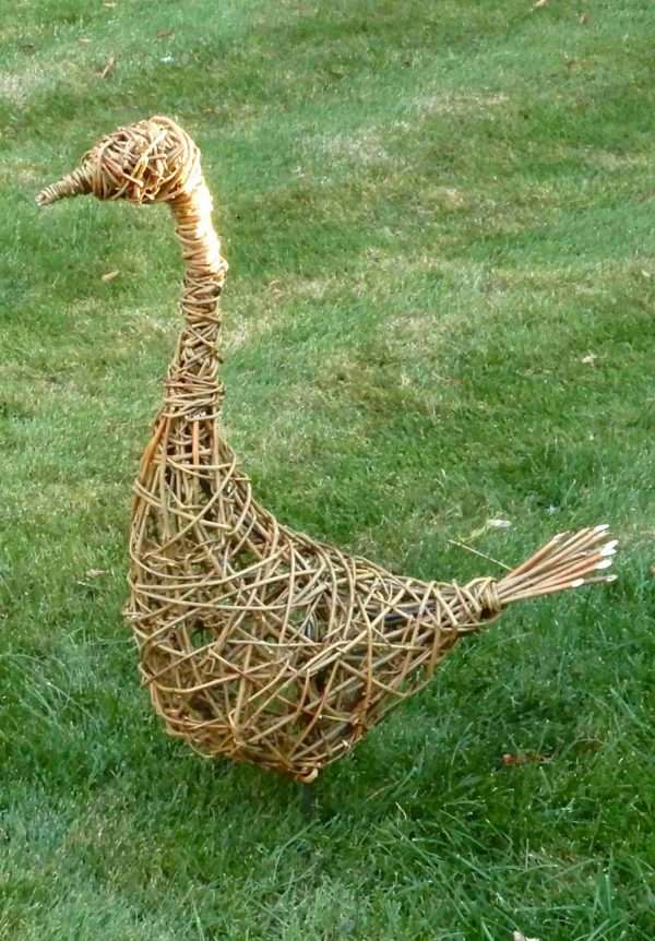 Goose 1 <p style="text-align: left" align="center">Willow goose.</p> <span style="font-weight: 400">Each of our products are handcrafted individual sculptures, which results in unique pieces, with slight differences between them.</span> <span style="font-weight: 400">Our sculptures are made to order and typically take between 2 - 4 weeks to complete. During busy periods, this may take longer, we will advise you by email if this is likely to be the case.</span> <span style="font-weight: 400">Available in three options:</span> <ul> <li><span style="font-weight: 400">Large goose, approximate height 108 cm, 42 inches</span></li> <li>Small goose standing upright<span style="font-weight: 400">, approximate height 80 cm, 31 inches</span></li> <li>Small goose with open beak<span style="font-weight: 400">, approximate height 60 cm, 24 inches</span></li> </ul> <strong>Price includes delivery to the United Kingdom.</strong>