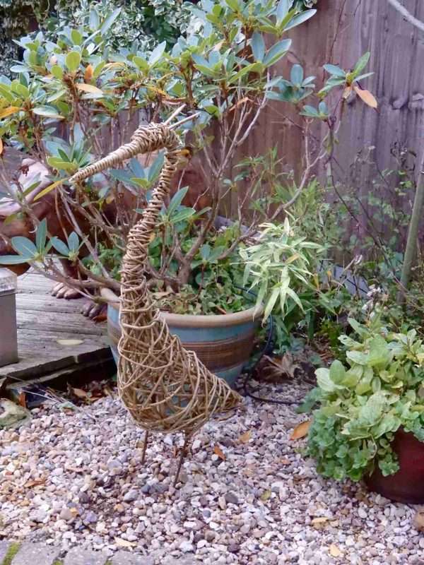 Heron 2 scaled <span style="font-weight: 400">Our Heron is in a standing position with his neck extended as he majestically views his surroundings.  He is made from willow with a steel frame for support.  The steel 'legs' are designed to be pushed into the ground in your chosen spot in the garden.</span> <span style="font-weight: 400">Each of our products are handcrafted individual sculptures, which results in unique pieces, with slight differences between them.</span> <span style="font-weight: 400">Our sculptures are made to order and typically take between 2 - 4 weeks to complete. During busy periods, this may take longer, we will advise you by email if this is likely to be the case.</span> <strong>Price includes delivery to the United Kingdom.</strong>