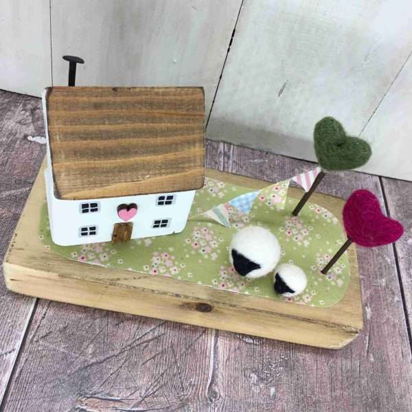 IMG 5949 scaled Individual handmade farm cottage with tiny sheep and hand cut bunting in the garden.  Price includes postage and packing.