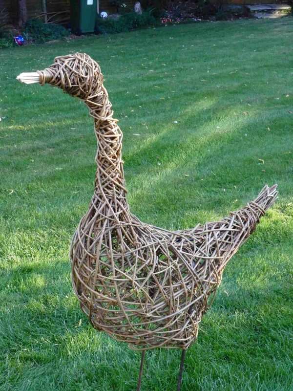 Large Goose <p style="text-align: left" align="center">Willow goose.</p> <span style="font-weight: 400">Each of our products are handcrafted individual sculptures, which results in unique pieces, with slight differences between them.</span> <span style="font-weight: 400">Our sculptures are made to order and typically take between 2 - 4 weeks to complete. During busy periods, this may take longer, we will advise you by email if this is likely to be the case.</span> <span style="font-weight: 400">Available in three options:</span> <ul> <li><span style="font-weight: 400">Large goose, approximate height 108 cm, 42 inches</span></li> <li>Small goose standing upright<span style="font-weight: 400">, approximate height 80 cm, 31 inches</span></li> <li>Small goose with open beak<span style="font-weight: 400">, approximate height 60 cm, 24 inches</span></li> </ul> <strong>Price includes delivery to the United Kingdom.</strong>