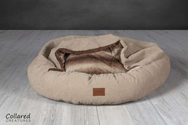 product photo of luxury cocoon dog cave bed by collared creatures