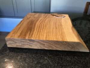 IMG 2783 1 Hardwood chopping board approx 30-40cm wide x 20-25cm deep x 3-6cm thick. Natural waney edge. Oak/elm/ash/beech/cherry