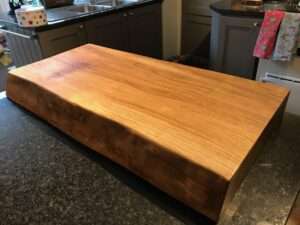 IMG 4132 Hardwood chopping board approx 70-85cm x 40-50cm x 8-10cm . Natural waney edge. Oak/elm/ash/beech/cherry