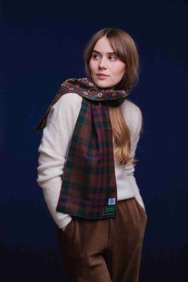 LoullyMakes Studio 4 31 scaled Classic Long scarf in our own exclusive John Muir way tartan with Liberty Print tana lawn cotton lining, carefully designed and handmade in Scotland by LoullyMakes . Simply select your choice of printed art fabric lining from the drop-down menu. (The example long scarf pictured here features lining 4) 100% Wool Tartan, 100% cotton lining