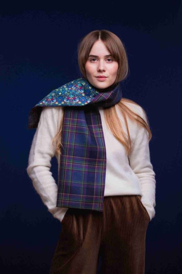 LoullyMakes Studio 4 34 scaled Classic Long scarf in our exclusive Highland Mist tartan with Liberty Print tana lawn cotton lining, carefully designed and handmade in Scotland by LoullyMakes . Simply select your choice of printed art fabric lining from the drop-down menu. (The example long scarf pictured here features lining 9 ) 100% Wool Tartan, 100% cotton lining