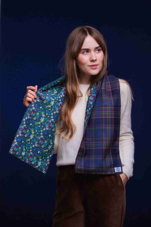 LoullyMakes Studio 4 36 scaled Classic Long scarf in our exclusive Highland Mist tartan with Liberty Print tana lawn cotton lining, carefully designed and handmade in Scotland by LoullyMakes . Simply select your choice of printed art fabric lining from the drop-down menu. (The example long scarf pictured here features lining 9 ) 100% Wool Tartan, 100% cotton lining