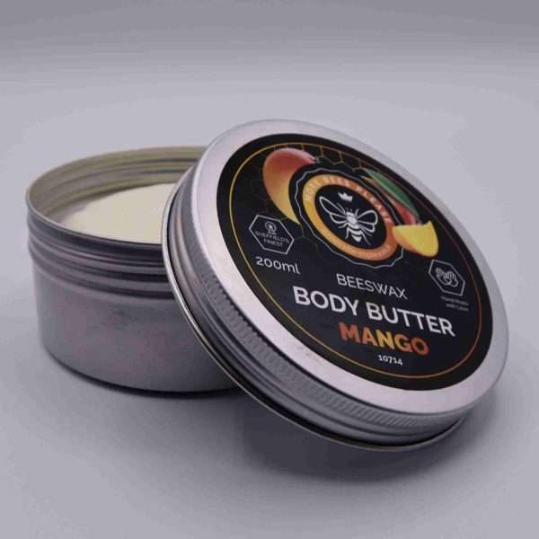 200ml Mango Body Butter scaled <strong>Our Beeswax Body butter is a skin moisturiser that is thicker than lotions and is extra effective at rejuvenating dry skin, whether used all over or only on problem patches, such as elbows and knees. Replenishes skin with moisture, Skin feels more comfortable, Indulgently rich butter texture that sinks into the skin, Non greasy and non-sticky, excellent for dry to very dry skin, but also a great all rounder for all skin types. 72 hours of ultra-rich moisture.</strong> <strong>So far, our body butters have helped with the following skin conditions:</strong> <ul> <li><strong>Psoriasis </strong></li> <li><strong>Eczema </strong></li> <li><strong>Dermatitis </strong></li> <li><strong>Nappy Rash </strong></li> <li><strong>Cradle Cap </strong></li> <li><strong>Prickly Heat </strong></li> <li><strong>Insect Bites </strong></li> <li><strong>Burns from the oven, hot pans (Stops skin blistering) </strong></li> <li><strong>Sun Burn </strong></li> <li><strong>Dry skin </strong></li> <li><strong>Cracked Heals </strong></li> <li><strong>It's also a perfect skin softener, does not leave skin feeling greasy afterwards, smells AMAZING, and great to use as a massage cream! </strong></li> <li><strong>100% Natural, cosmetically tested, </strong></li> <li><strong>Natural antihistamine, </strong></li> <li><strong>Safe to use on babies</strong></li> </ul>