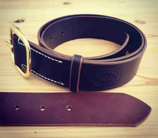 20210206 212708 scaled Hand-crafted leather belt. Made-to-measure from the finest English full grain leather. Hand-stitched. Leather colour: black, dark brown, chestnut, tan, or natural. Solid brass or nickel-plated buckle. Personalise - add embossed lettering for no additional cost. Eg, initials, name, nickname.