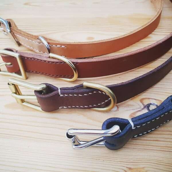 IMG 20210201 215151 492 Hand-crafted leather dog collar. Made from the finest English full grain leather. Embossed design - choose from pheasant, deer, duck, fish. Hand-stitched. Leather colour: black, dark brown, chestnut, tan, or natural. Solid brass or nickel-plated hardware.