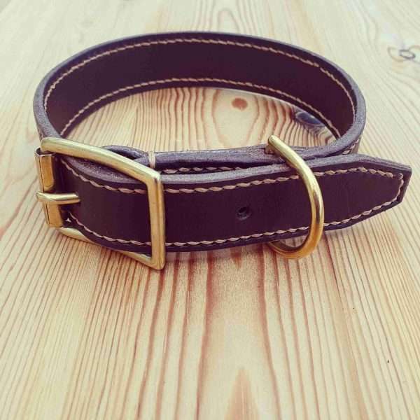 IMG 20210214 065422 750 scaled Hand-crafted leather dog collar. Made from the finest English full grain leather. Decorative hand-stitched. Leather colour: black, dark brown, chestnut, tan, or natural. Solid brass or nickel-plated hardware. Personalised - add your initials, dogs name, surname, postcode, or phone number.