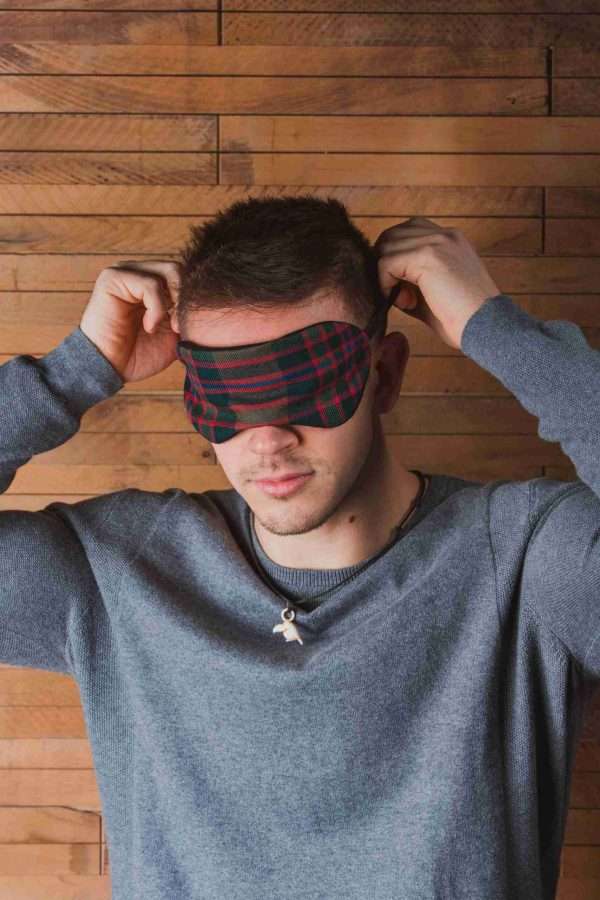 Loullymakes studio by Rose and Julien108 scaled Scented herb-filled eyemask, in our own exclusive John Muir Way tartan and backed with a soft cotton velvet with a narrow elastic headband. Supplied in a Calico Gift Pouch. Each eyemask is filled with my own recipe of dried lavender, chamomile and hops - a combination which acts as a relaxing fragrance. Enliven the scent occasionally by shaking the mix inside the eyemask, or place near a warm radiator for a fragrance boost . NB DO NOT PLACE NEAR ANY NAKED FLAME OR DIRECT HEAT SOURCE. Very comfortable to wear , the eyemask can be worn to aid sleep , or just to enjoy the calming aroma. NB PLEASE REMOVE BEFORE FALLING ASLEEP.