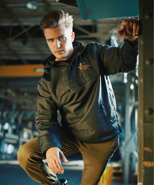 Pheasant Cut Out <h5>Men's wind and water repellent windbreaker suitable for work and leisure.</h5> <ul> <li>Embroidered pheasant logo to left chest.</li> <li>The outer material is durable as well as wind and water-repellent.</li> <li>Inside a mesh lining provides additional comfort.</li> <li>Further practical details include; hood with drawstring,</li> <li>lateral ventilation hole and cuffs.</li> <li>Sufficient space for your belongings provided by a large chest pocket with zipper.</li> <li>2 lateral pockets with zippers.</li> </ul> Available in<strong> Olive Green & Black </strong>