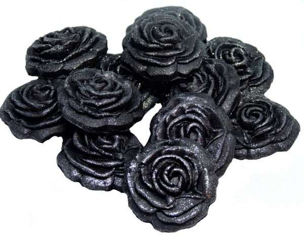 Inked12 Med Black Roses LI This selection of edible small roses is shown in fixed colour sets, we do have them available in mixed colour sets under a separate listing. All are glittered and due to their size are extremely popular as cake fillers. These roses make Ideal cupcake and cake topper decorations for Weddings, Birthdays, Valentine and Anniversary. We hand make all our own decorations. Approx Size 2 cm