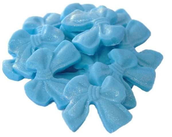 Inked12 blue sml bows Jpeg LI These small coloured Glittered edible bows decorations will enhance any cupcake or cake. Available in a choice of colours making them ideal for Weddings, Birthdays, Valentine & Anniversary decorations Approx Size: 24mm high - 28mm wide