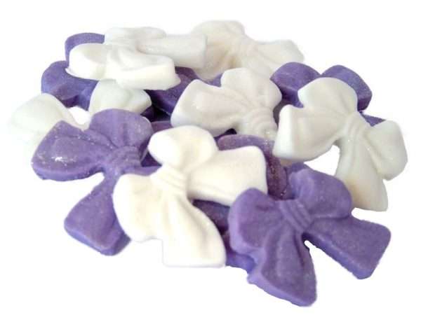 Inked12 light puple W smal bows jpeg LI These small coloured Glittered edible bows decorations will enhance any cupcake or cake. Available in a choice of mixed colour combinations making them ideal for Weddings, Birthdays, Valentine & Anniversary decorations Approx Size: 24mm high - 28mm wide