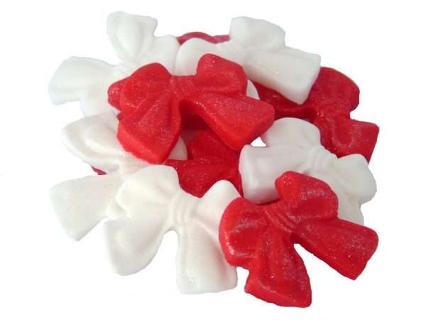 Inked12 red W small bows LI These small coloured Glittered edible bows decorations will enhance any cupcake or cake. Available in a choice of mixed colour combinations making them ideal for Weddings, Birthdays, Valentine & Anniversary decorations Approx Size: 24mm high - 28mm wide