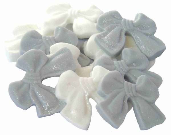Inked12 small bows silver and white LI scaled These small coloured Glittered edible bows decorations will enhance any cupcake or cake. Available in a choice of mixed colour combinations making them ideal for Weddings, Birthdays, Valentine & Anniversary decorations Approx Size: 24mm high - 28mm wide
