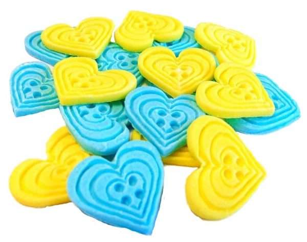 Inked18 Blue yellow Heart buttonjpeg LI If you’re looking for colourful edible heart shaped buttons to decorate your cupcakes and cakes then these are ideal for all your special occasions. Offering a choice of many single and mixed colours that are sure to please. Note: we also have square shaped buttons in same colours for those who would like to have a mix of each. 18 Heart Shaped Buttons Approx Size: 20mm high - 20mm wide