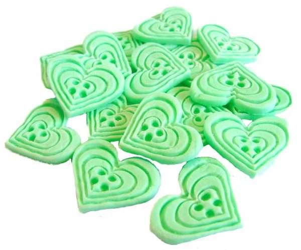 Inked18 light green heart buttons1jpeg LI If you’re looking for colourful edible heart shaped buttons to decorate your cupcakes and cakes then these are ideal for all your special occasions. Offering a choice of many single and mixed colours that are sure to please. Note: we also have square shaped buttons in same colours for those who would like to have a mix of each. 18 Heart Shaped Buttons Approx Size: 20mm high - 20mm wide