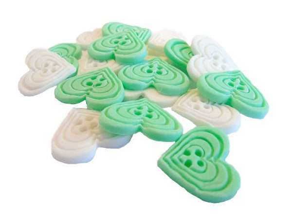 Inked18 light green white heart buttonsJPEG LI If you’re looking for colourful edible heart shaped buttons to decorate your cupcakes and cakes then these are ideal for all your special occasions. Offering a choice of many single and mixed colours that are sure to please. Note: we also have square shaped buttons in same colours for those who would like to have a mix of each. 18 Heart Shaped Buttons Approx Size: 20mm high - 20mm wide