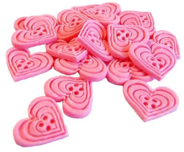 Inked18 pink heart buttons1jpeg LI If you’re looking for colourful edible heart shaped buttons to decorate your cupcakes and cakes then these are ideal for all your special occasions. Offering a choice of many single and mixed colours that are sure to please. Note: we also have square shaped buttons in same colours for those who would like to have a mix of each. 18 Heart Shaped Buttons Approx Size: 20mm high - 20mm wide