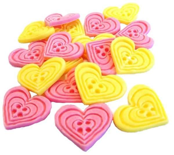 Inked18 pink yellow heart buttons1jpeg LI If you’re looking for colourful edible heart shaped buttons to decorate your cupcakes and cakes then these are ideal for all your special occasions. Offering a choice of many single and mixed colours that are sure to please. Note: we also have square shaped buttons in same colours for those who would like to have a mix of each. 18 Heart Shaped Buttons Approx Size: 20mm high - 20mm wide