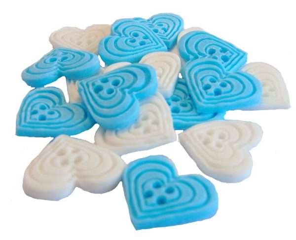 InkedInked18 blue white heart buttons1 LI If you’re looking for colourful edible heart shaped buttons to decorate your cupcakes and cakes then these are ideal for all your special occasions. Offering a choice of many single and mixed colours that are sure to please. Note: we also have square shaped buttons in same colours for those who would like to have a mix of each. 18 Heart Shaped Buttons Approx Size: 20mm high - 20mm wide