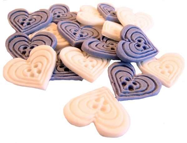 InkedInked18 purple white heart buttons1 LI If you’re looking for colourful edible heart shaped buttons to decorate your cupcakes and cakes then these are ideal for all your special occasions. Offering a choice of many single and mixed colours that are sure to please. Note: we also have square shaped buttons in same colours for those who would like to have a mix of each. 18 Heart Shaped Buttons Approx Size: 20mm high - 20mm wide