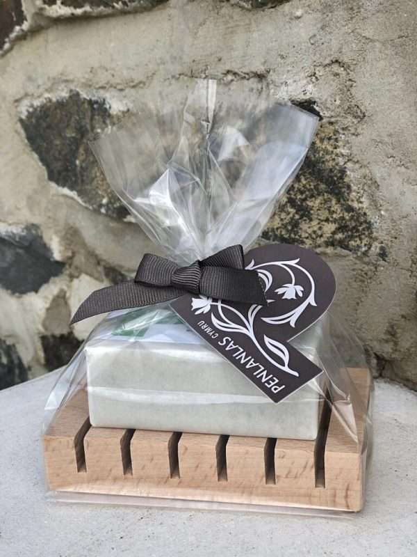 936402c5 ba25 4666 8e01 35d6d530c3da A soap bar of your choice with a wooden soap saver, designed to extend the life of your soap. Packaged in a cellophane bag with ribbon and tag. Standard bar soap is 90g min weight