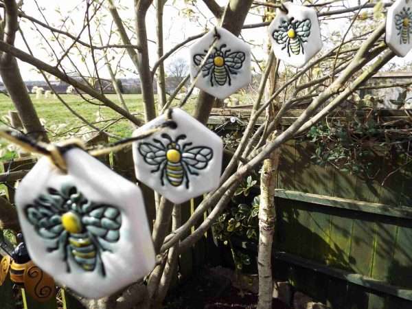 DSCF1919 scaled Beautiful handmade ceramic bunting with a bumblebee design.