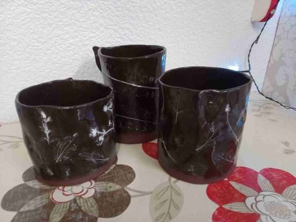 IMG 20210104 152133 019 scaled Beautiful hand build vases using dark stoneware clay, imprinted with wild flowers and leaves to give it a rustic countryside look. Three sizes, small, medium and large.