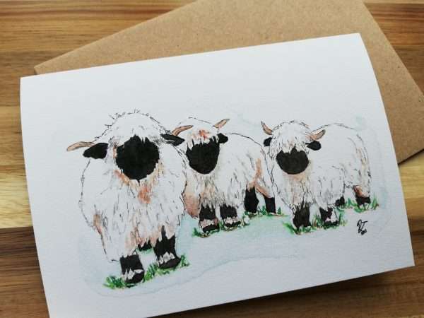 IMG 20210420 185512 An A6 greeting card featuring three Valais Blacknose Sheep, by Rachel Tweddell Art