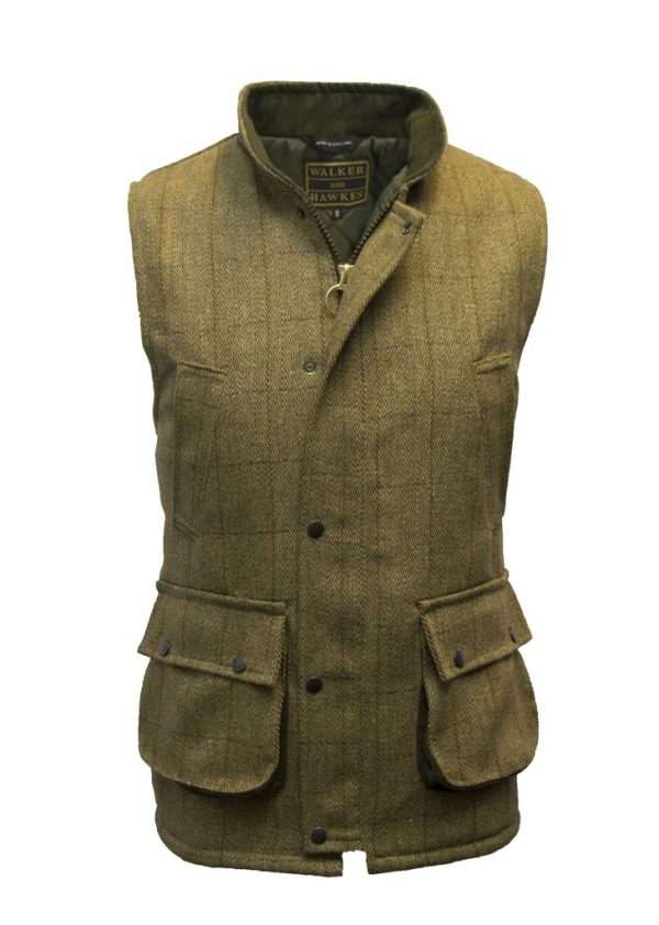TWEED GILET LIGHT 1 zpsl4vie7zc Internal padded Linning is 100% Polyester, to ensure resistance against harsh weather condition. Internal linning has a diamond quilted pattern. Outer jacket (Shell) is made from 60% Wool, 25% Polyester, 11% Acrylic and 4% composed of other fibres, making this jacket top quality fabric. Other features include 2 hand warmer pockets, 2 front bellow pockets, 2-way heavy duty zip, and moleskin trimming around the collar and pockets. Produced to the highest standards by a manufacturer of top quality countrywear and derby clothing. The tweed has been treated with Teflon which acts as a fabric protector, making this product long-lasting protection against oil- and water-based stains, dust and dry soil. Please check our size guide against your waistcoat you wish to purchase.