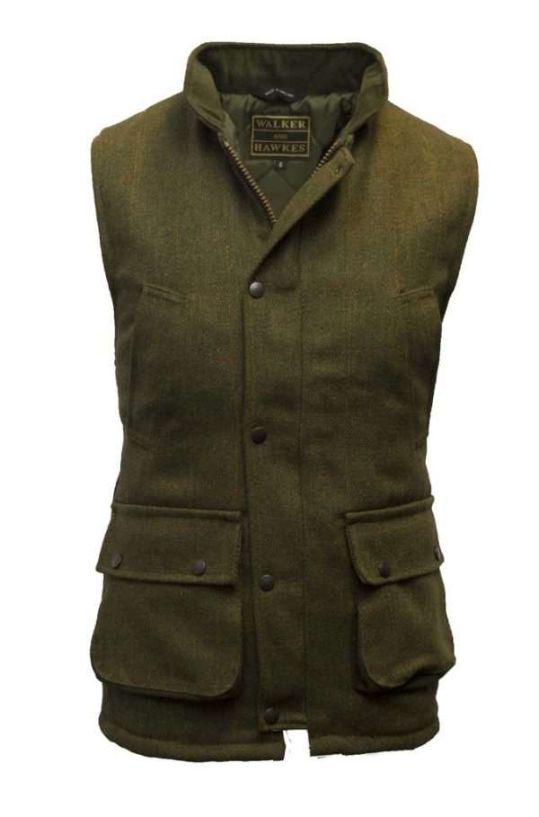 TWEED GILET dark 1 zps7dbmmu3e Internal padded Linning is 100% Polyester, to ensure resistance against harsh weather condition. Internal linning has a diamond quilted pattern. Outer jacket (Shell) is made from 60% Wool, 25% Polyester, 11% Acrylic and 4% composed of other fibres, making this jacket top quality fabric. Other features include 2 hand warmer pockets, 2 front bellow pockets, 2-way heavy duty zip, and moleskin trimming around the collar and pockets. Produced to the highest standards by a manufacturer of top quality countrywear and derby clothing. The tweed has been treated with Teflon which acts as a fabric protector, making this product long-lasting protection against oil- and water-based stains, dust and dry soil. Please check our size guide against your waistcoat you wish to purchase.
