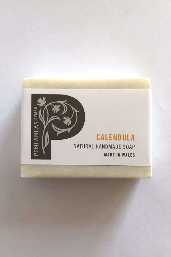 calendula soap wrapped Made with pure botanical oils infused with dried Calendula petals, known for their healing properties and enriched with extra moisturising shea butter. Gently cleansing, and soothing with a natural light floral scent - no essential oils have been added. A mild and gentle soap bar, suitable for sensitive, delicate and problem skin.