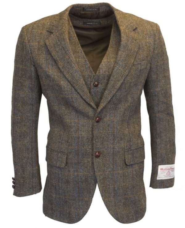 clinton brown blazer wc These world famous Harris Tweed jackets are superbly tailored, hard-wearing and warm. When purchasing one of these jackets you are guaranteed exceptional quality. By law Harris Tweed must come from the Outer Hebrides, and be hand woven from local wool. Supplied by Harris Tweed Scotland from 100% pure virgin wool, dyed, spun and finished in the Western Isles of Scotland. Expertly hand-woven by crofters in their own homes on the islands of Lewis, Harris, Uist and Barra. They are single breasted with two leather button fastening, and can be worn as a casual jacket or with a shirt and tie. Other specifications include side vents, two front pockets with flaps, Four interior pockets, three button leather cuff and Fully lined. Spare Button Leather buttons included. Dress with matching waistcoat for an extremely stylish look perfect for weddings and the races. All our tweeds are stamped with the authentic, official gold crossed orb mark of the Harris Tweed Authority.