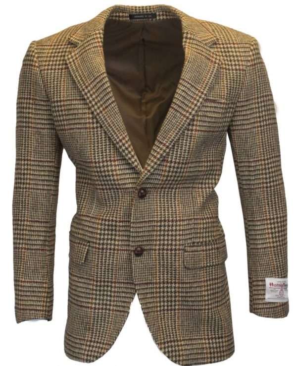 dessert tan blazer front These world famous Harris Tweed jackets, are superbly tailored, hard wearing and warm. When purchasing one of these jackets you are guaranteed exceptional quality. By law Harris Tweed must come from the Outer Hebrides, and be hand woven from local wool. Supplied by Harris Tweed Scotland from 100% pure virgin wool, dyed, spun and finished in the Western Isles of Scotland. Hand-woven by crofters in their own homes on the islands of Lewis, Harris, Uist and Barra. They are single breasted with two leather button fastening, and can be worn as a casual jacket or with a shirt and tie. Other specifications include side vents, two front pockets with flaps, Four interior pockets, three button leather cuff and Fully lined. Spare Button Leather buttons included. Dress with matching waistcoat for an extremely stylish look perfect for weddings and the races. All our tweeds are stamped with the authentic, official gold crossed orb mark of the Harris Tweed Authority.