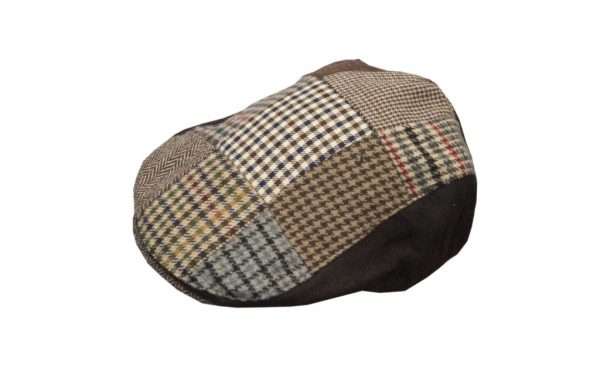 patch flat cap brown up 1 Inner Linning is 100% quilted polyester padded lining, with an inner trim band for extra comfort. Outer jacket (shell) is made from 20% wool, 80% polyester. All Patchwork is styled with tartan and dogtooth patterns. Produced to the highest standards by a manufacturer of top quality countrywear and derby clothing. Please check our size guide against your cap you wish to purchase.