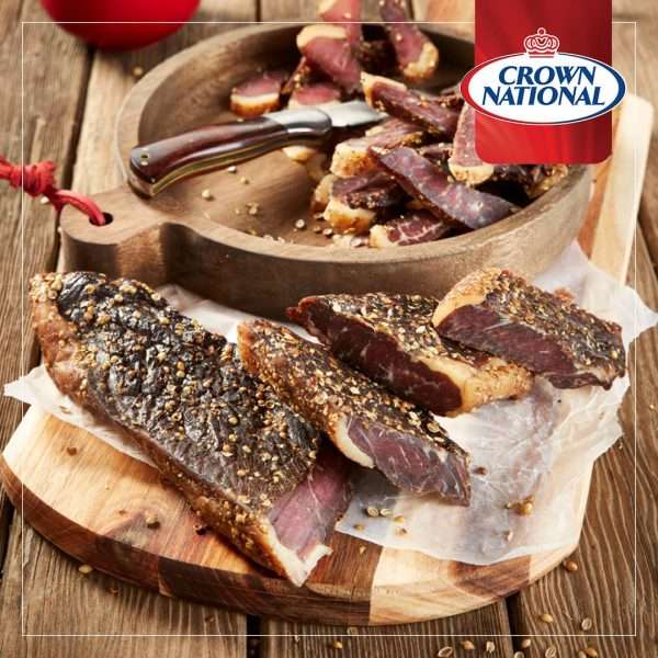 safari biltong pic <b><u>Crown National Spices- Safari Biltong Seasoning 200g </u></b> <strong>Authentic Southern African Spices and Seasonings imported from the most southern tip of the African continent. These spices and seasonings have a proud heritage that dates back to 1912. A unique taste and finest level of quality in every pack. </strong> Size: 200g <b><u>Description: </u></b> •This Safari seasoning is ideal to use to make your own mild perfect Biltong (Almost like dried beef jerky) •This delicious legendary seasoning has beefy and coriander notes. •The seasoning is great for BBQ's or in Afrikaans a Braai, and for stews. <b><u>Ingredients:</u></b> Flavouring [(<b>Celery</b>)Maize Flour, Maize Meal, Colourants, MSG (Flavour Enhancer), Hydrogenated Vegetable Fat (Palm Fruit), Anticaking Agent, Acidity Regulator, Spice Extract (Antioxidant- TBHQ)], Salt, Spices, Sugar, Preservative (Potassium Sorbate) <b><u>Allergens: </u>Celery</b> Produced in a factory where Cow's Milk, Egg, Mustard, Soy, Wheat Gluten are used.