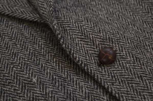 steel grey blazer button These world famous Harris Tweed jackets are superbly tailored, hard-wearing and warm. When purchasing one of these jackets you are guaranteed exceptional quality. By law Harris Tweed must come from the Outer Hebrides, and be hand woven from local wool. Supplied by Harris Tweed Scotland from 100% pure virgin wool, dyed, spun and finished in the Western Isles of Scotland. Expertly hand-woven by crofters in their own homes on the islands of Lewis, Harris, Uist and Barra. They are single breasted with two leather button fastening, and can be worn as a casual jacket or with a shirt and tie. Other specifications include side vents, two front pockets with flaps, Four interior pockets, three button leather cuff and Fully lined. Spare Button Leather buttons included. Dress with matching waistcoat for an extremely stylish look perfect for weddings and the races. All our tweeds are stamped with the authentic, official gold crossed orb mark of the Harris Tweed Authority.