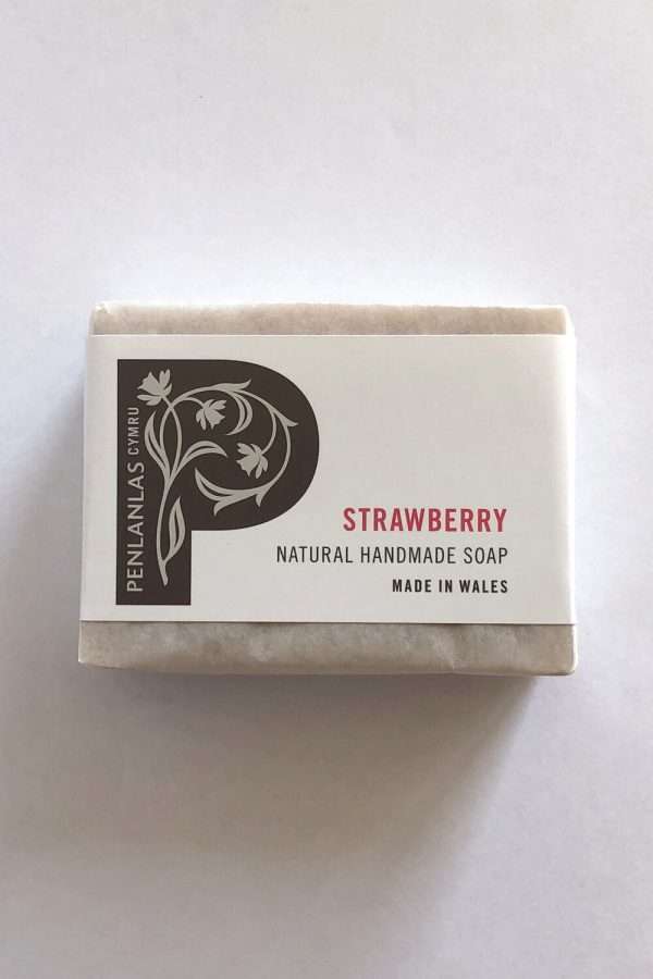 strawberry soap wrapped Made with pure botanical oils, homegrown strawberries (rich in antioxidants and Vitamin C, with the seeds acting as a natural and gentle exfoliant) and enriched with shea butter. Naturally coloured using pink Argiletz clay. Fragranced with Rose Geranium essential oil which aids to reduce tension and uplift the mind.