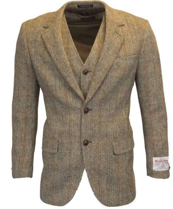 white sand blazer wc 1 These world famous Harris Tweed jackets, are superbly tailored, hard wearing and warm. When purchasing one of these jackets you are guaranteed exceptional quality. By law Harris Tweed must come from the Outer Hebrides, and be hand woven from local wool. Supplied by Harris Tweed Scotland from 100% pure virgin wool, dyed, spun and finished in the Western Isles of Scotland. Hand-woven by crofters in their own homes on the islands of Lewis, Harris, Uist and Barra. They are single breasted with two leather button fastening, and can be worn as a casual jacket or with a shirt and tie. Other specifications include side vents, two front pockets with flaps, Four interior pockets, three button leather cuff and Fully lined. Spare Button Leather buttons included. Dress with matching waistcoat for an extremely stylish look perfect for weddings and the races. All our tweeds are stamped with the authentic, official gold crossed orb mark of the Harris Tweed Authority.