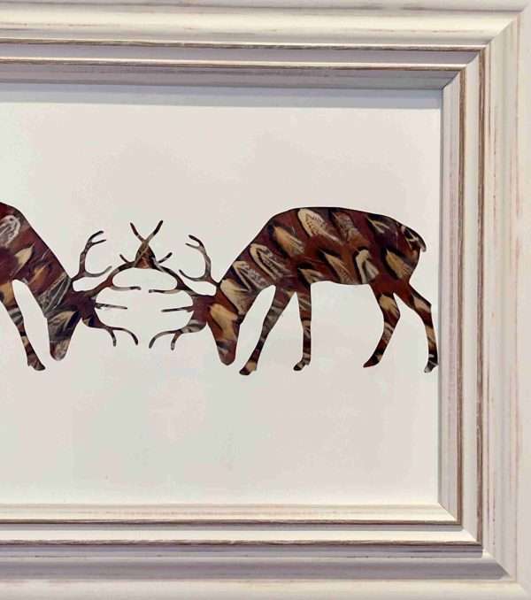 0D80FEE2 FE40 43A0 B1EB BC19A8B32B27 scaled Stunning Rutting Stags silhouette crafted with hand picked pheasant feathers. The Picture comes framed Due to the nature of the feathers no two pictures are the same and may differ slightly from the picture. All the feathers are 100% locally sourced and the picture hand crafted on our farm in Devon. This gorgeous picture is sure to look great in any home or shooting lodge and bring the elegance of the British countryside inside. This picture is perfect as a gift for anyone with a country/shooting or hunting theme and can easily be personalised with names or dates added. Would make great Father’s Day present or birthday present. Other designs are available