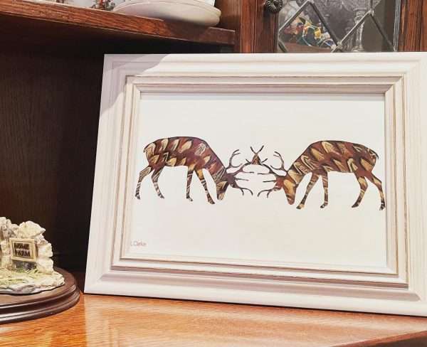 4F5F8F04 8562 4D37 A460 D0D99B614E1A Stunning Rutting Stags silhouette crafted with hand picked pheasant feathers. The Picture comes framed Due to the nature of the feathers no two pictures are the same and may differ slightly from the picture. All the feathers are 100% locally sourced and the picture hand crafted on our farm in Devon. This gorgeous picture is sure to look great in any home or shooting lodge and bring the elegance of the British countryside inside. This picture is perfect as a gift for anyone with a country/shooting or hunting theme and can easily be personalised with names or dates added. Would make great Father’s Day present or birthday present. Other designs are available