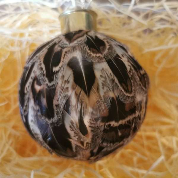 Beautiful carefully handcrafted baubles . Made using only the finest Ringneck Hen Pheasant Feathers to create something stunning. Available as either Cock or Hen.