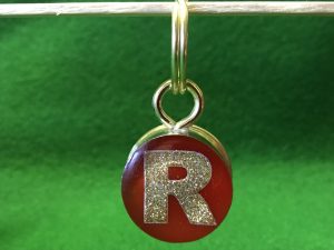Gold or silver letters on a Red, Green or Black resin background