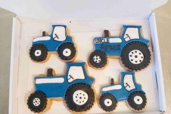 processed 2 scaled Letter box Friendly Tractor Butter Shortbread Biscuits. Available red,gree,blue tractors