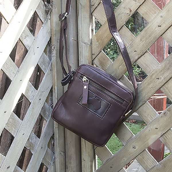 9101w w6 Coming in gorgeous dark brown and made from the highest quality oiled leather, this small bag is the perfect mix of rustic style and functionality