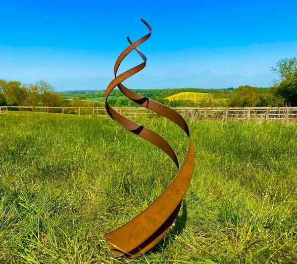 WELCOME TO THE RUSTIC GARDEN ART SHOP Here we have one of our. Rustic Spiral Fire Energy Flowing Organic Metal Sculpture **Sizes are approximate and design is approximate - each spiral is handmade and comes out slightly different** Small: 45cm height x 17cm width 2mm All of our garden stake art come with garden stakes affixed or prongs enabling a quick & easy install!