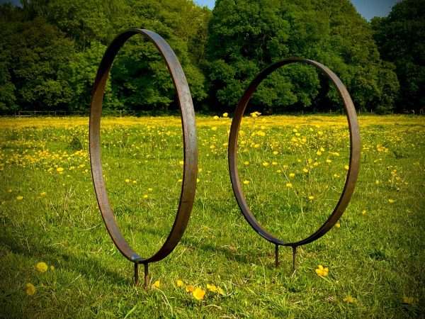 WELCOME TO THE RUSTIC GARDEN ART SHOP Here we have one of our. Rustic Metal Garden Ring Hoop Sculpture - Pair of Rusty Ring Circle Garden Art / Globe / Sphere Interchangeable metal ring sculptures - one is slightly smaller so fits within the other ring with two stakes per ring. Enabling you to arrange your own formation or design. These two rustic garden rings make a unique, versatile garden sculpture. Arrange the rusty metal rings in any formation to create your very own unique piece of affordable garden decor. Our Rustic/Rusty patina gives a natural and unique finish, which will continue to better with age. Our rustic garden art products require absolutely no maintenance! Sizes & Measurements:
Large: approx 100cm diameter - made from flat steel 40mm x 10mm These are perfect for any garden or are great as a gift. All our garden art come with either garden stakes affixed or brackets enabling a quick & easy install, wall art is just the outline with no holes. we advise using tack nails for fixing. Please check prior to purchasing depending on which one you'd like.